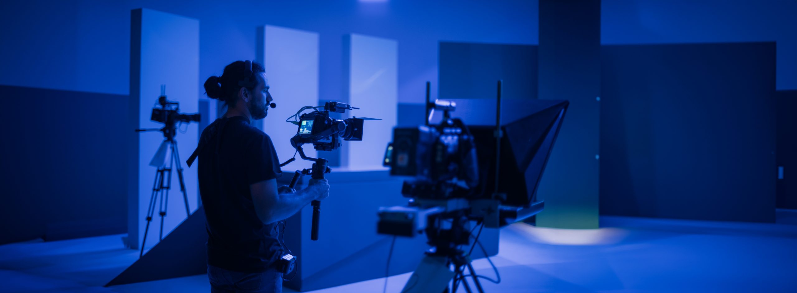 Director of photography with a camera in his hands on the set.